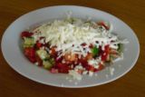 Míchaný salát s kukuřicí (rajče, okurka, paprika, kukuřice,                   balkánský sýr)