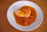Závitek s parmskou šunkou (kuřecí prso, parmská šunka, mozzarella, sardele, kapary, rajčata)